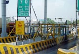 A Serious Cage to Protect Toll Takers on the Road in India