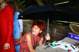 Under umbrella in hut