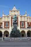 Monument of Adam Mickiewicz and Sukiennice in background