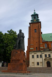 Statue of King Boleslaw Chrobry and Cathedral tower in distance