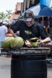 Cutting a coconut and not his hand