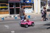 And a proud little lady in her pink car