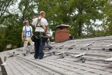 attaching micro inverters to the rails.jpg