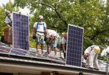 attaching solar panels.jpg