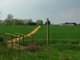 Over  the  footbridge  and  up  the  brae  to  Paris  Hall  Farm.