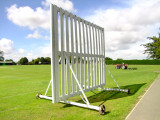The  cricket  batting  screen  with  Ken  and  his  tractor  behind.