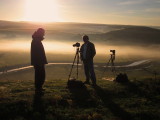 On  a  crowded  outcrop,  above  a  misty  valley.......