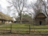 a farm setting with dwelling and outbuildings