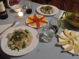 sausage pelmeni with onion topping, smoked trout with lemon, rocket salad, and pears with cheese