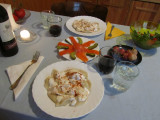varenyky with cream and paprika, trout and pickle, salad, grapes
