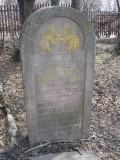 few gravestones are still standing like this one