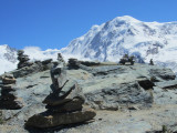 near the top, a whimsical set of cairns, or steinmänner, or ometti