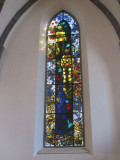 the church has stained glass by Augusto Giacometti