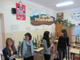Karolina Wenda, Gina Kuhn, Dominika Michalska, and me on a tour of the classrooms