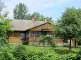 up again at street level, we pass more historic wooden houses