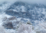 Squaw Peak in the Clouds and Snow