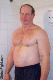 wet muscle man showering.jpg