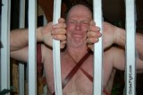 caged older bdsm daddy.jpg