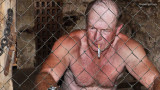 man smoking prisoner jailed.jpg