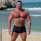 musclebear beach posing big arms.jpeg