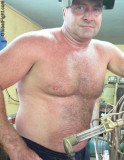 man welding shirtless working hot sweaty.jpg