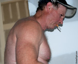 hot older man smoking jobsite worker.jpg