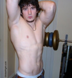 bedroom weightlifting home gym workout young guy.jpg