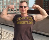 biceps flexing jock wrestler.jpg
