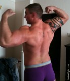 gay bear foto huge large jock flexing biceps.jpg