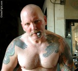 hot cigar man leather pig tattoos hairychest bear.jpg