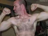 sweating armpits tattoo mans chest.jpg