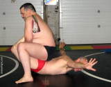 shirtless neighbors wrestling in garage men friends.jpg