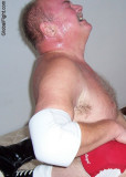 sweaty big thick neck man bear wrestling.jpg