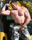 construction musclemen flexing big biceps.jpg