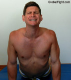 man stretching back muscles yoga husband cute daddy.jpg