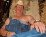 cowboy daddy working hard taking break resting shirtless.jpg
