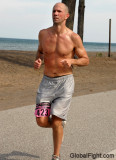 man jogging running beach park sweating dripping wet.jpg