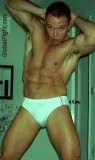 tightie whitties muscleman flexing in underwear smooth hunk.jpg