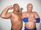mean pro wrestling tagteam brothers kicking butts.jpg