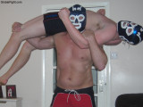 chunky masked wrestlers lifting opponents backbreakers.jpg