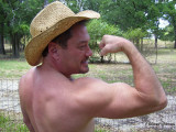 redneck straw hat gay man flexing muscles ranch.jpg