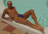 silverfoxy daddy lounging poolside sweaty suntanning men.jpg