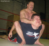 dad choking cocky punk kid pro wrestling photos.jpg