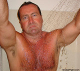 very wet handsome man showering bathing soaked.jpg