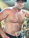 wet men welding working shirtless sweaty hunky daddies.jpg