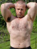 dads flexing big hairy arms stomach pecs crewcut.jpeg