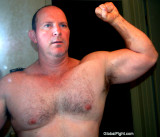 handsome all american jock hot daddie flexing arms.jpg