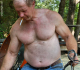 junkyard mechanic working shirtless dirty man.jpg