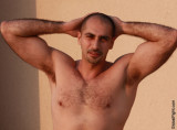 young studly musclepup hottie showing armpits.jpg