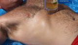 a very hairy man swimming suntanned hunky dude.jpg